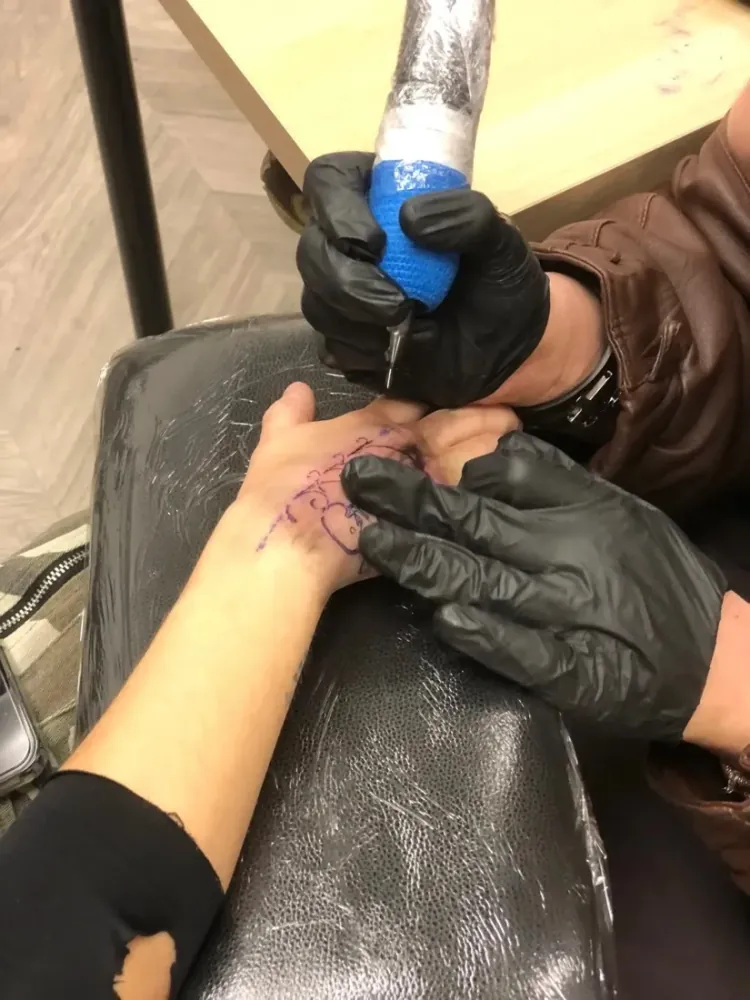 A beauty professional adding fine line tattooing to their services